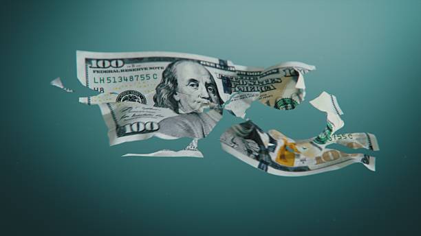 istock 3D Graphics of One Hundred Dollar Bill Torn Into Pieces. Visualization of Economic Crisis 2207361491