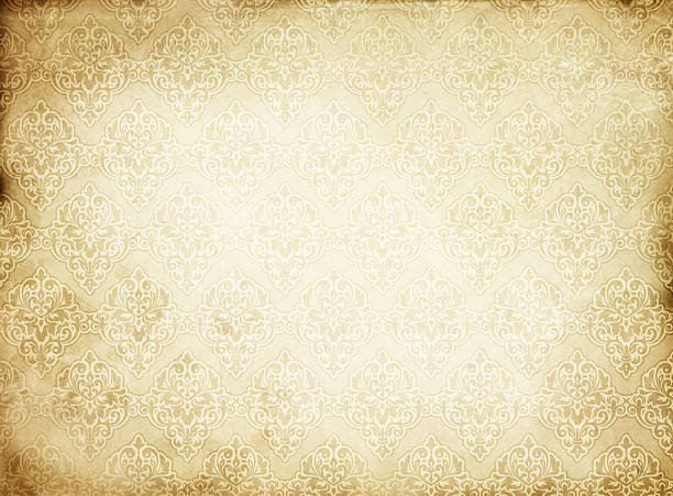 istock Aged grunge paper background with decorative vintage ornament. 2207364449