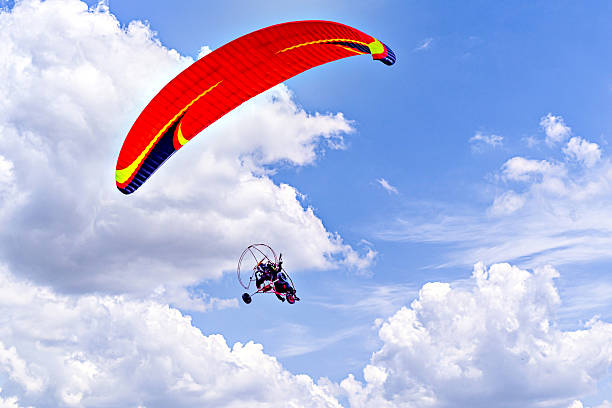 istock Paragliding adventure with a red and blue parachute 2207366941