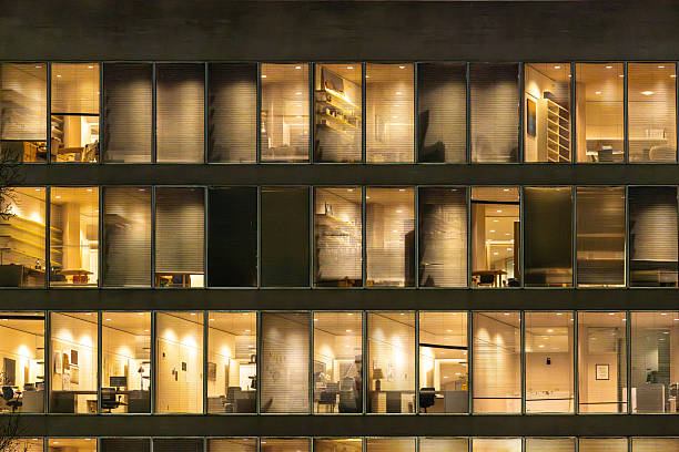 Closeup of illuminated office windows at night