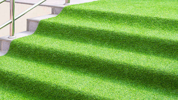 istock Decorative artificial grass mat on steps of stair for outdoor event, Exterior architecture decoration background, side view 2207367296