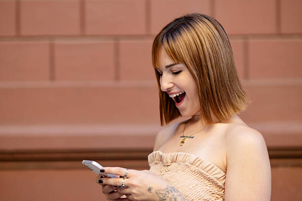 istock Generation Z and millennial girls using a smartphone 2207369874