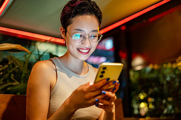 istock Generation Z and millennial girls using a smartphone 2207370047