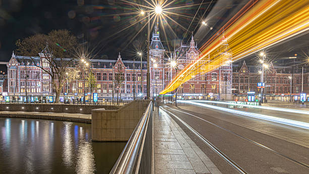 istock Amsterdam reflects in Netherlands by night 2207373054