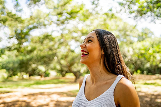 Young woman contemplating at public park