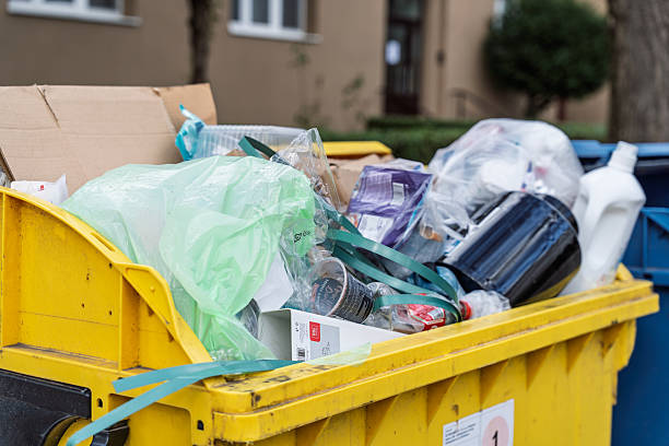 istock Yellow bin full of plastic trash, Waste heap, Plastic bag waste 2207378916