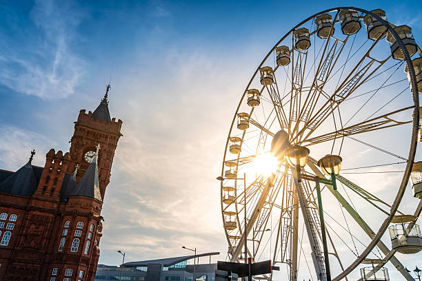 istock Sun shines through big wheel at Cardiff Bay waterfront 2207378986