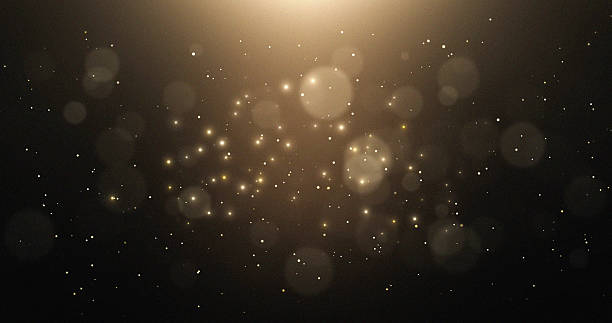 Golden Dust Particles Sparkling Lights Bokeh Background Abstract Design Glowing Shimmer Elegant Luxury Festive Celebration Bright Shimmering Glamour Dark background with golden bokeh lights and sparkling dust particles. Elegant and festive design. mystery texture stock illustrations