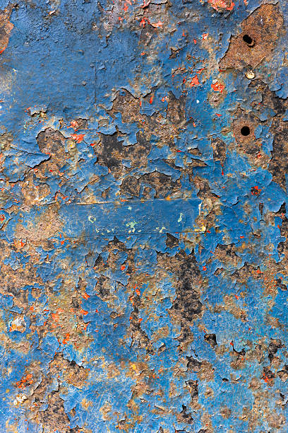 istock Distressed Peeling Weathered Industrial Blue Paint on Rusty Corroded Metal Grunge Texture Background 2207381174