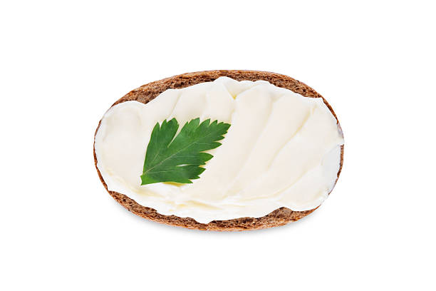 istock Rye buns with butter topping on a white isolated background 2207383140