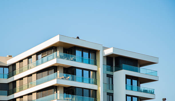 istock Modern Building with White Balconies & Black Metal Shades 2207385346