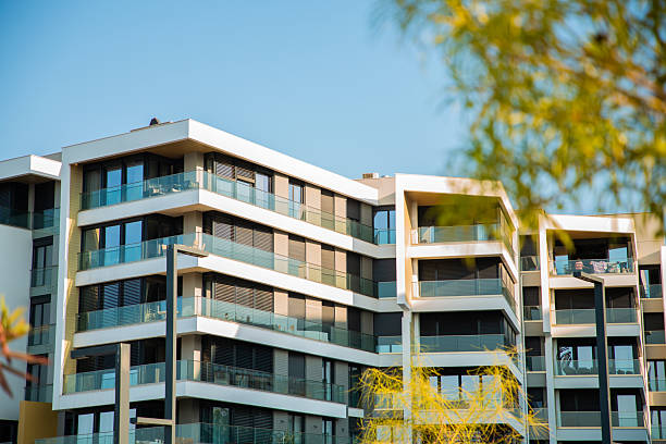 istock Modern Building with White Balconies & Black Metal Shades 2207385349