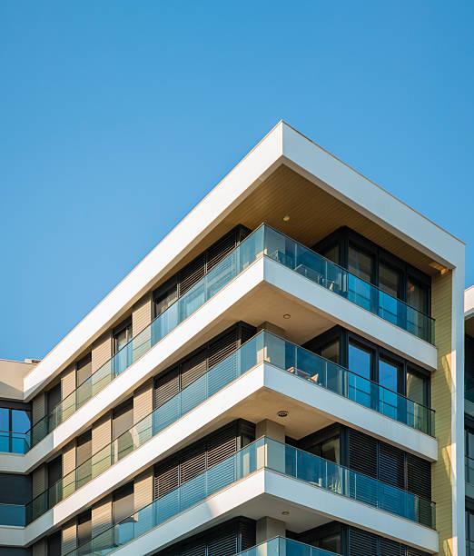 istock Modern Building with White Balconies & Black Metal Shades 2207385418