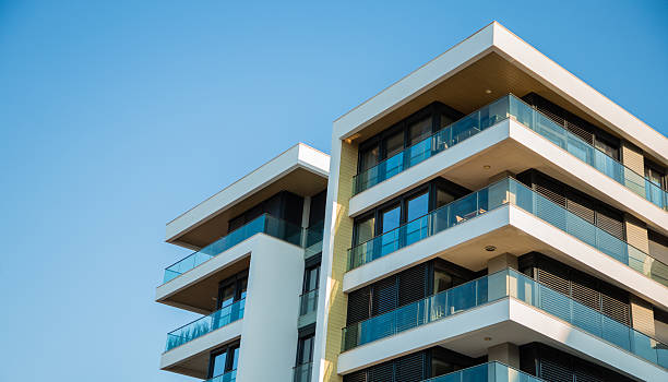 istock Modern Building with White Balconies & Black Metal Shades 2207385419