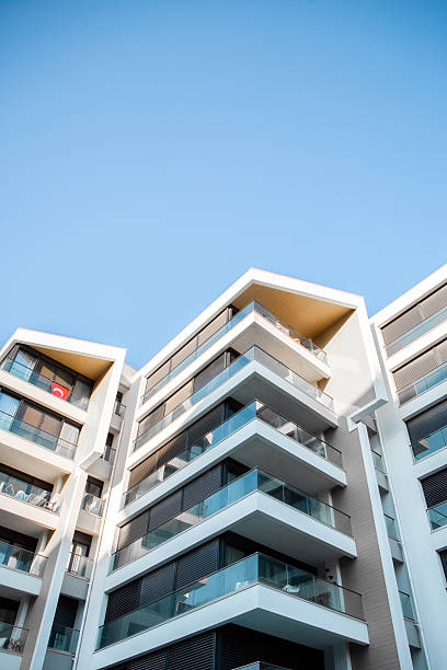 istock Modern Building with White Balconies & Black Metal Shades 2207385533