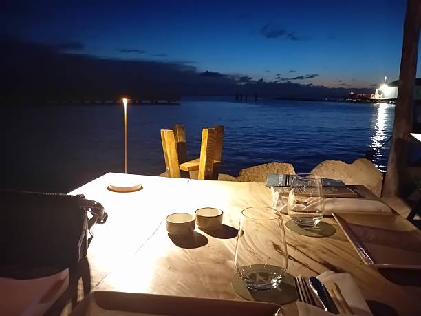 istock Dinner by the sea in a restaurant outside at night on Curacao 2207388722