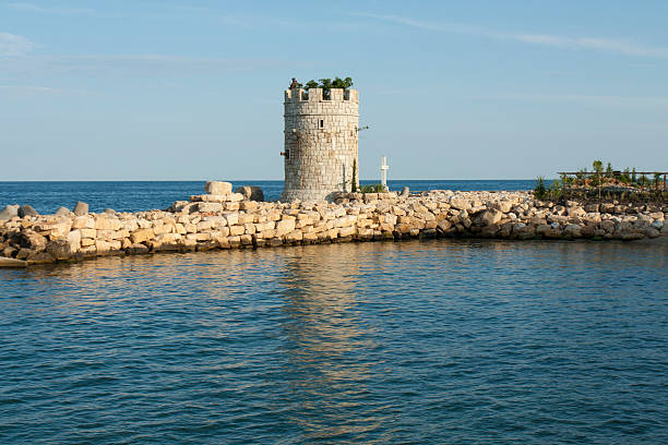 istock ST.ST.CONSTANTINE AND HELENA, BULGARIA - JULY 05, 2019: Decorative tower on the beach, resort complex St. St. Constantine and Helen, Varna, Bulgaria 2207389628