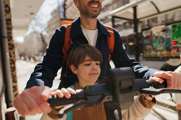 istock With an electric scooter through the town 2207393778