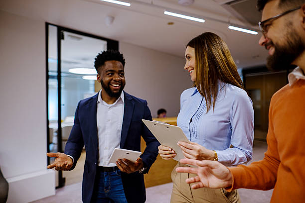 istock Business team discussing work in modern office space 2207394237