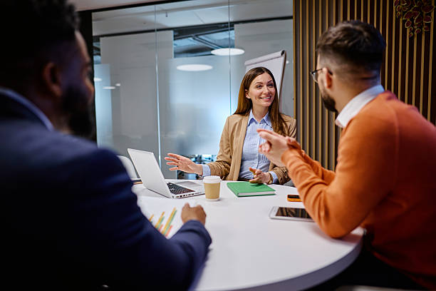 istock Business team discussing during a meeting in a modern office 2207394692