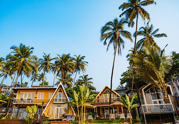 istock Tropical Resort with A-Frame Cottages and Palm Trees in Goa, India 2207398540