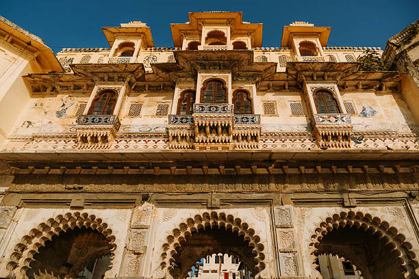 istock Yellow Architecture with Intricate Detailing and Blue Sky in Udaipur, India 2207398788