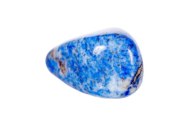istock Macro mineral stone blue lapis lazuli (afghanistan) on white background 2207402577