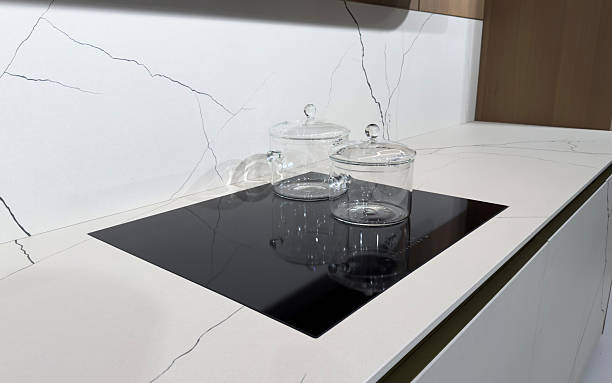 istock Glass saucepan on a modern induction hob 2207402630