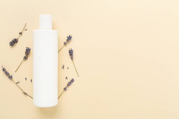 istock Cream with lavender extract on color background,, top view 2207405965