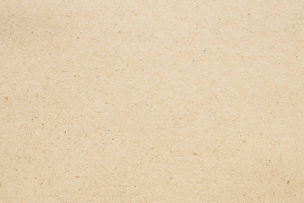 istock Old brown recycle cardboard kraft paper texture background 2207411572