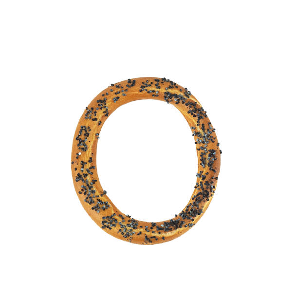 istock Single Poppy Seed Bagel Isolated on White 2207412282