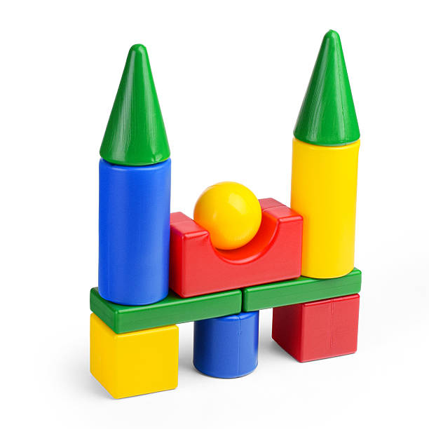 A colored tower of plastic cubes isolated on a white background. Children's construction kit for play and development.