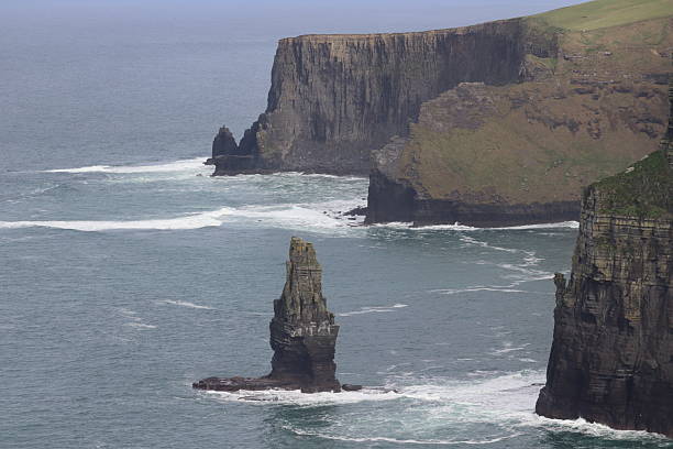 The Cliffs of Moher are one of Ireland's most iconic natural landmarks, attracting millions of visitors each year. Located on the west coast of Ireland in County Clare, these towering cliffs offer breathtaking views of the Atlantic Ocean and the Aran Islands in the distance.