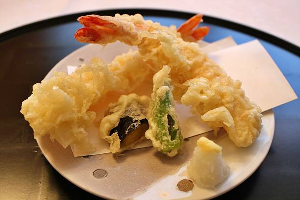 istock Japanese cuisine: tempura platter (shrimp, shishito pepper and eggplant) in Tokyo, Japan 2207443347