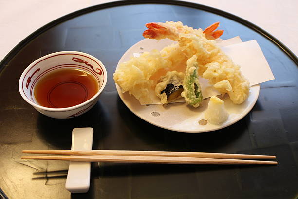 istock Japanese cuisine: tempura platter (shrimp, shishito pepper and eggplant) in Tokyo, Japan 2207443352