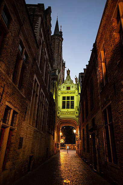 istock Illuminated Brugse Vrije Archway at Dusk - Bruges, Belgium 2207449921