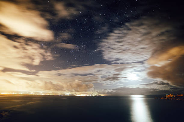istock Fantastic starry sky over the sea. 2207454019