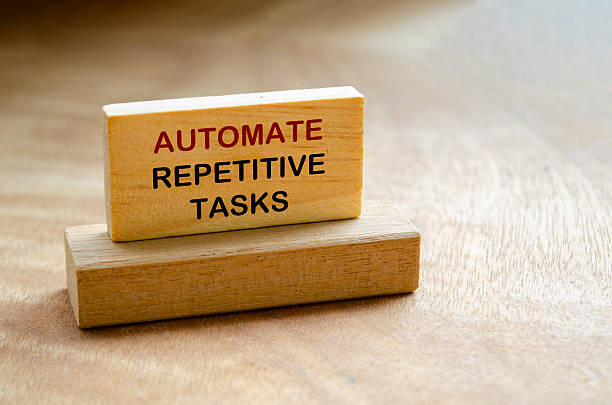 istock Automate Repetitive Tasks text on wooden block with customizable space for text 2207454968