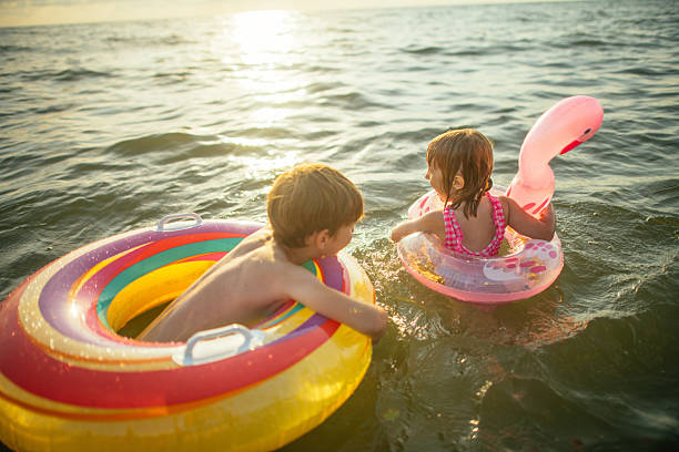 istock Children enjoying beach holidays 2207456191