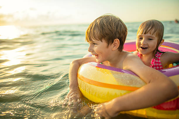 istock Children enjoying beach holidays 2207456194