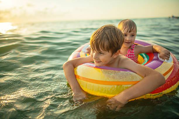 istock Children enjoying beach holidays 2207456198