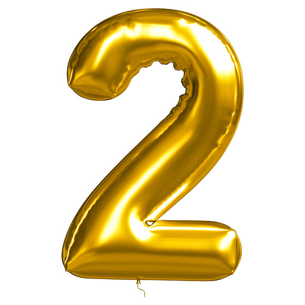 istock Golden number Two balloons with shiny foil reflecting light. 2207458426