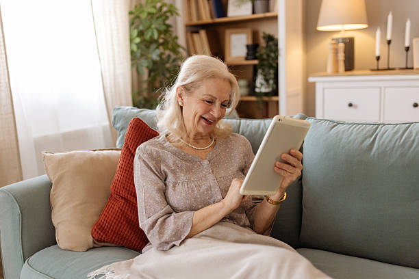 istock Modern Grandmother Staying Connected with Technology 2207461528