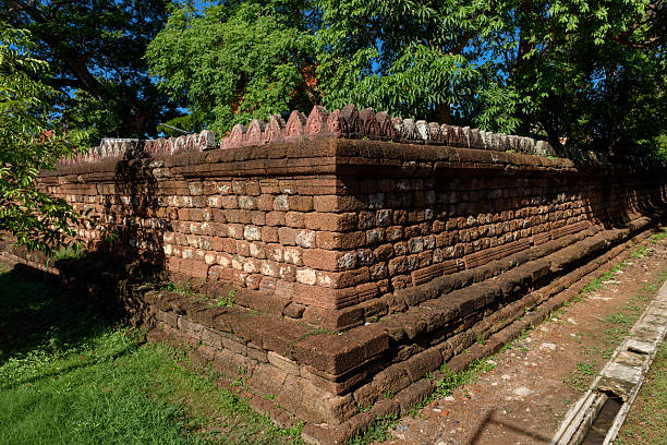 istock buddha relief on wall Wat Mahathat Ratchaburi, Thailand 2207462480