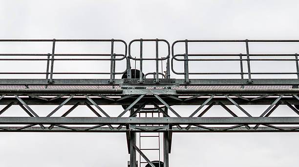 istock close-up drone view of truss frame on a train signal gantry 2207463347