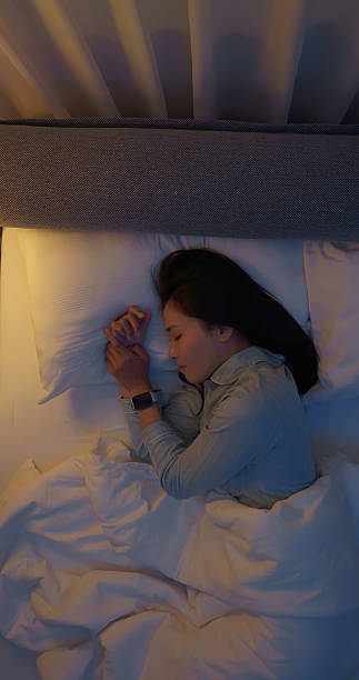 istock asian woman good sleep quality 2207465965