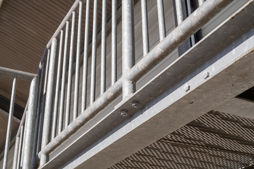 Bolted Railing Metal Balcony Railing With Vertical Bars And Hexagonal Bolts Securing ...