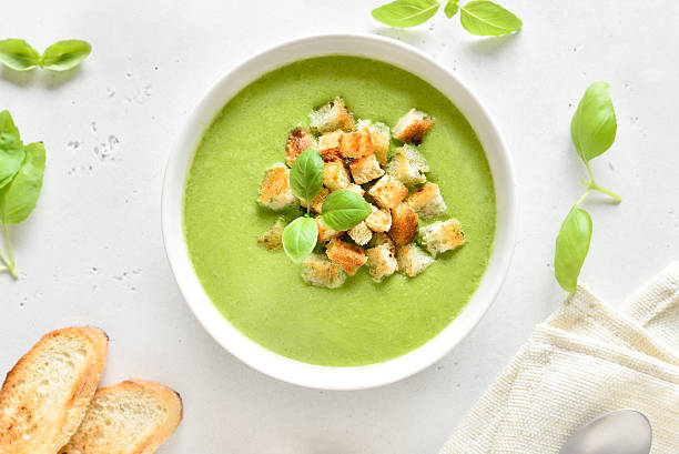 istock Spinach soup with croutons in white bowl 2207466976