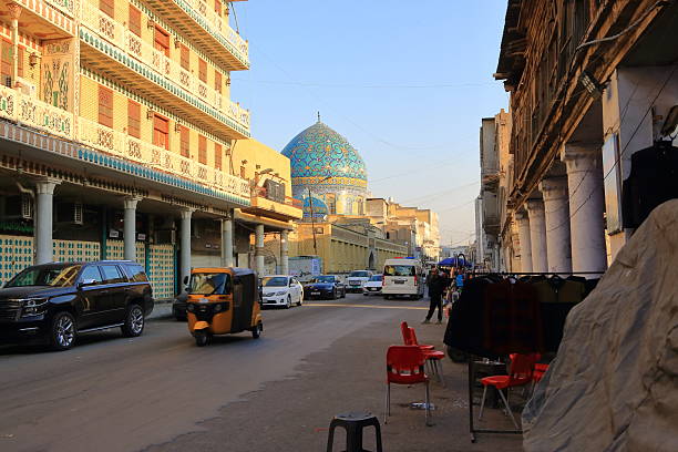 every day life with cars on the streets, location near Rashid Street in Baghdad, Iraq stock photo