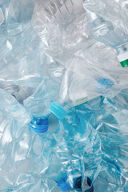 istock Crushed plastic bottles. Background concept of waste pollution, recycling, environmental responsibility, sustainability, solutions, global challenges, eco-friendly awareness, nature conservation, waste reduction, and circular economy initiatives. 2207472335